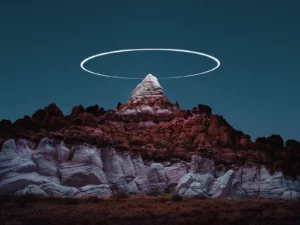 drone light painting halo around a mountain peak